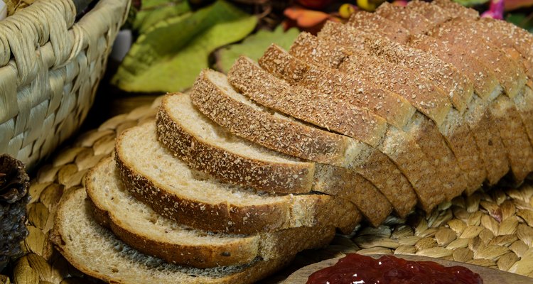 still life brown whole grain bread and jam