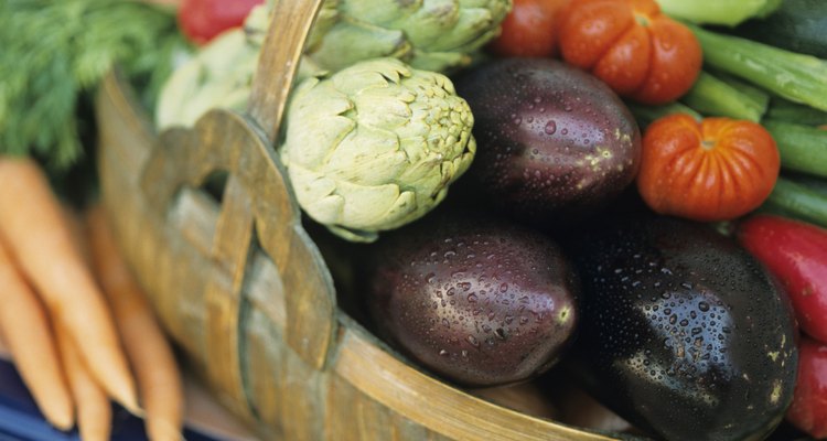 Basket of vegetables in garden, close-up