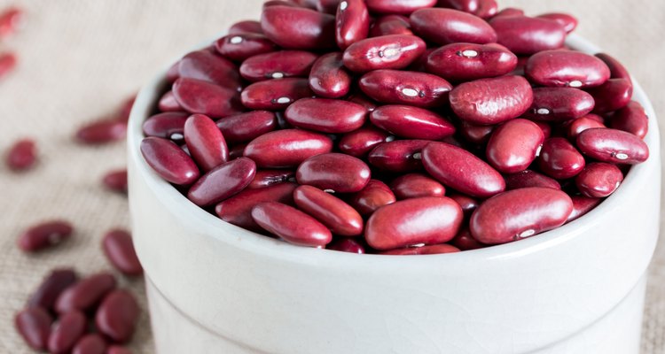 red kidney bean in white bowl on gunny