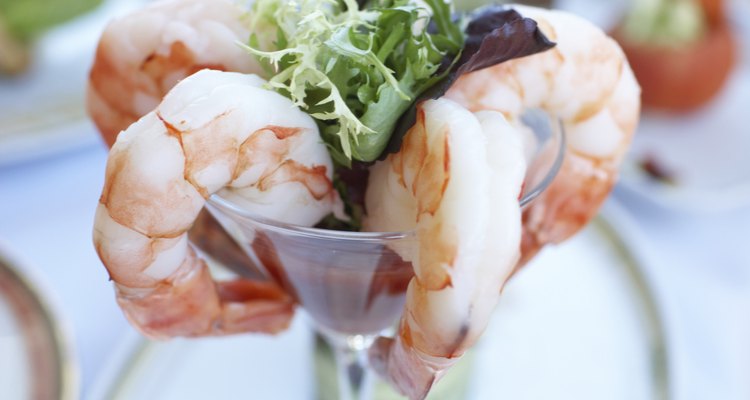 Shrimp cocktail served in stem glass