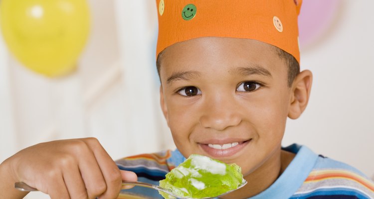 Boy eating gelatin cake