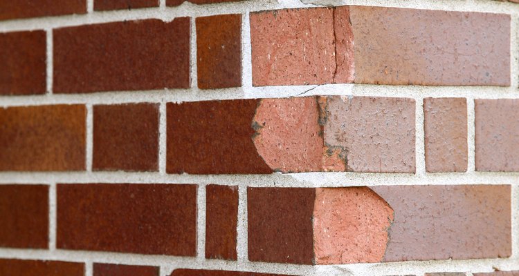 Avoid damage to brick walls by installing ledger boards. to distribute weight.