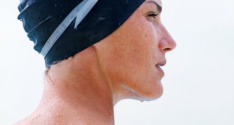 Woman Wearing a Swim Cap and Goggles