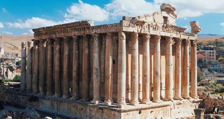 Roman temple roofs were supported by many columns.