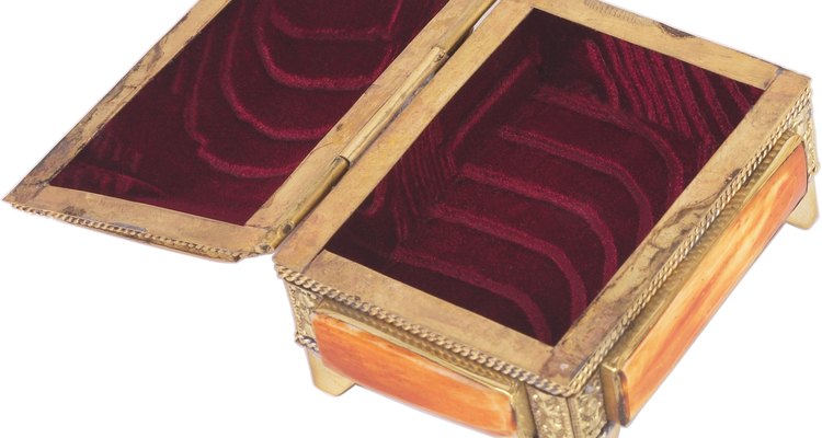 Line any box with felt using trim adhesive.