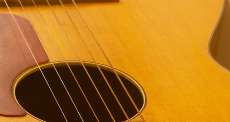 A collapsed guitar top may bulge, rather than sink.