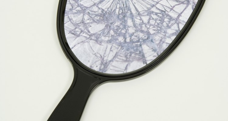 Safely break glass to be used in mosaics.