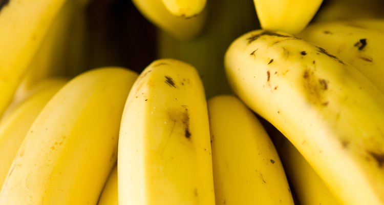 Decorate a cake with bananas for an attractive finishing touch.