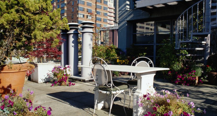 Un tejado plano puede proporcionarte un patio si vives en un área urbana sin césped.