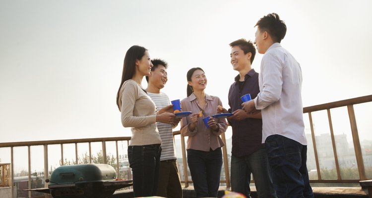 Group of Friends Having a Barbeque on a Rooftop