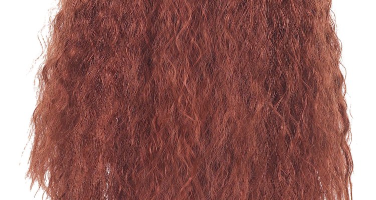 Hair was crimped and worn down, or tied into a high ponytail.