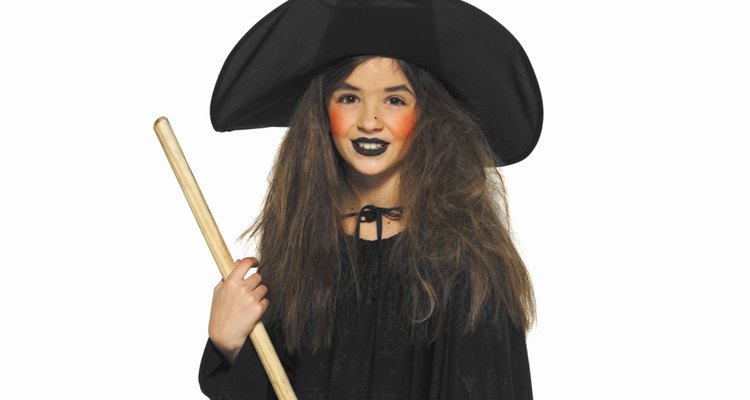 Medieval witches carry plain corn brooms.