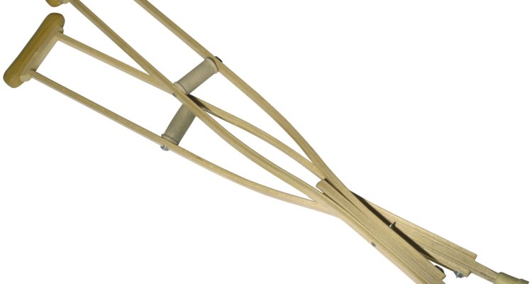 In an emergency, one can create improvised crutches from household items such as broomsticks.