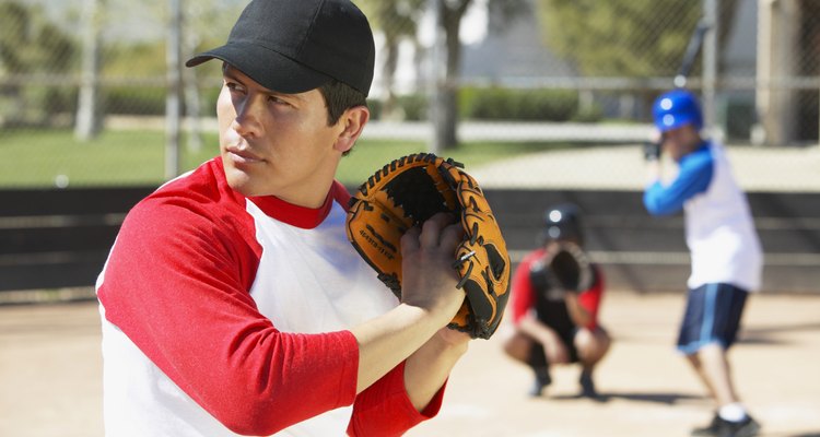 Man Playing Baseball in a Court, Wearing a Baseball Glove