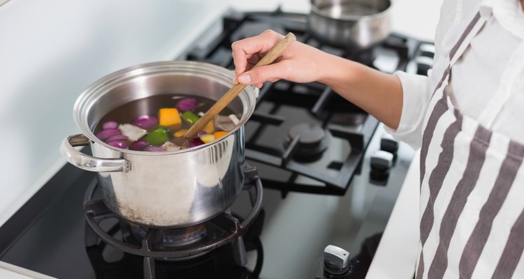 Close up on woman mixing vegetables