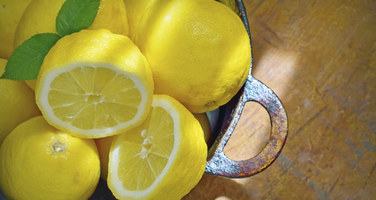 fresh lemons on a wood table