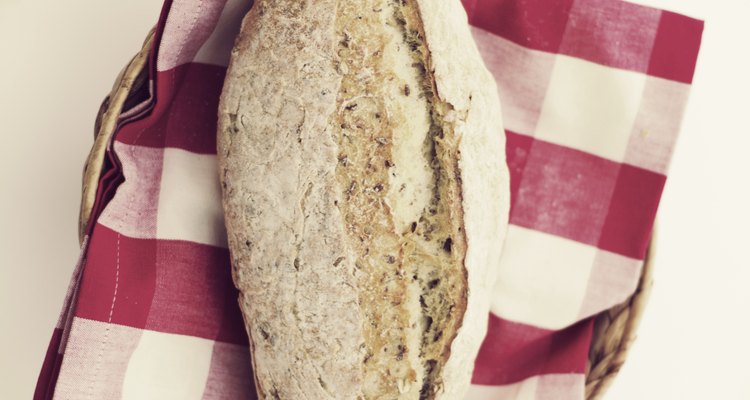 Artisan bread on red gingham table