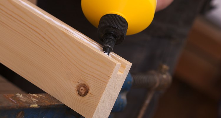 A standard wood glue will do the job.