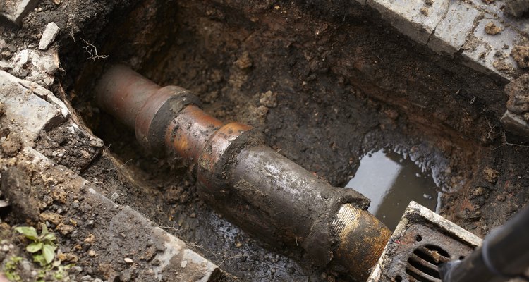 Connect household PVC pipe to the sewer system.