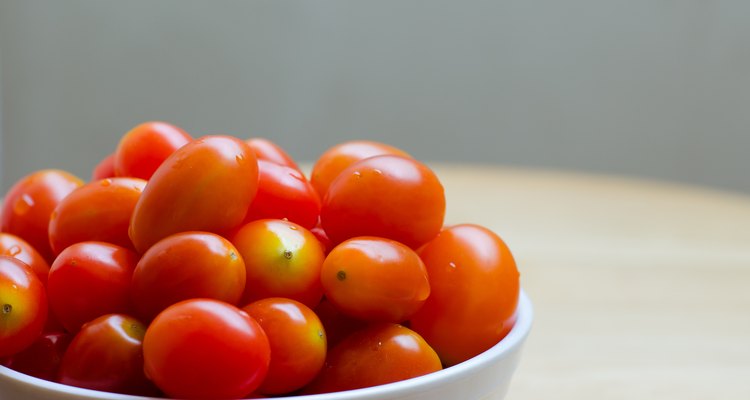 Cherry Tomatoes In White Ceramic Bowl Close Up.