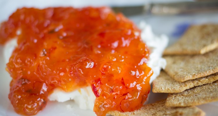 Red Apricot Pepper Jelly Served over cream cheese