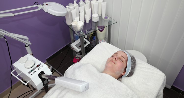 Beauty treatment of young female face, ozone facial steamer