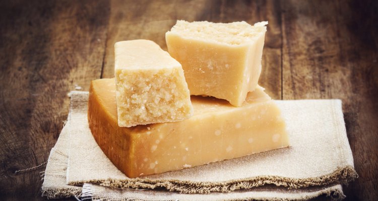 Italian  Parmesan Cheese on Wooden Background close up.