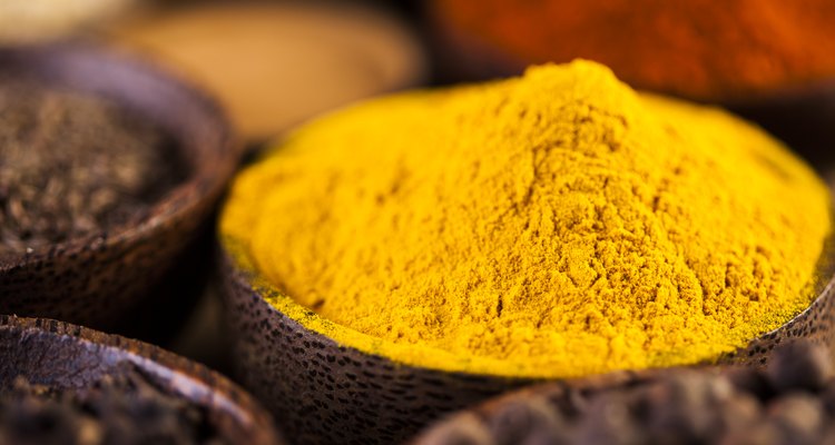 Wooden table of colorful spices