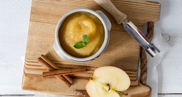 Applesauce with cinnamon in stoneware bowl