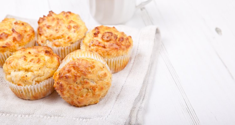 Savory cheese and bacon muffins on the white table