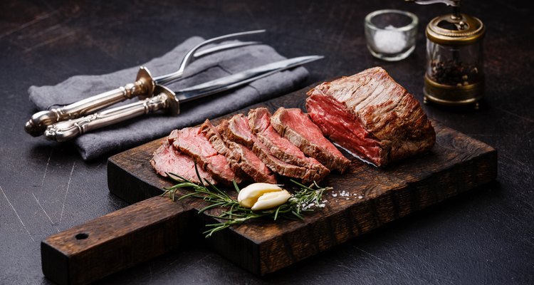 Sliced Tenderloin meat Roast beef and carving set