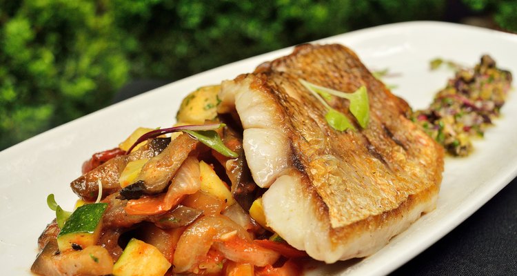 Chilean Sea Bass with potatoes and vegetables on the patio