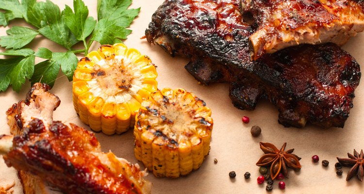 Barbecue spare ribs with corn on wood