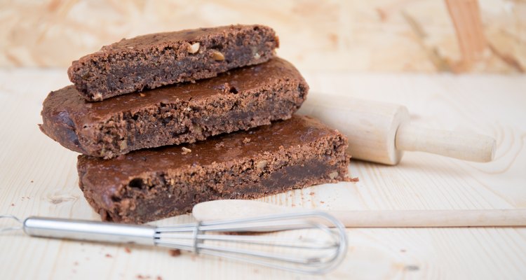 Tasty Stack of three pieces of chocolate brownie cake