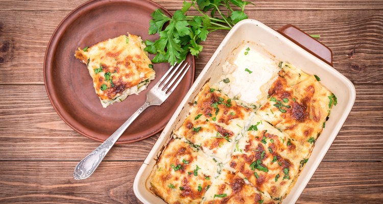 Chicken lasagna and white cheese .