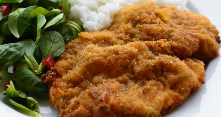 Schnitzel with salad and rice, detail
