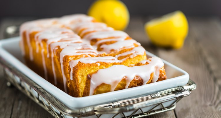 Lemon yogurt loaf cake, sliced on plate