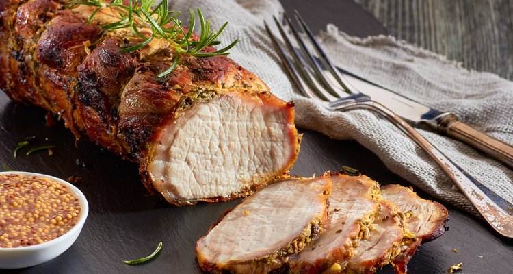 Roasted pork loin with rosemary, served with whole grain mustard
