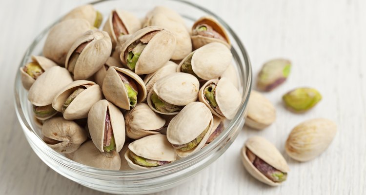 Pistachio nuts in a glass bowl