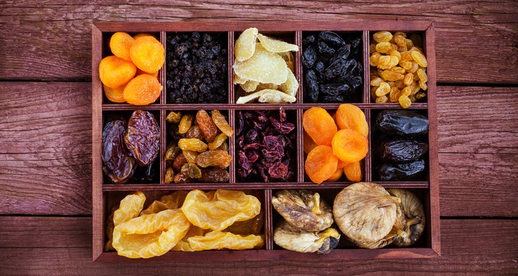 Assorted dried fruits in wooden box