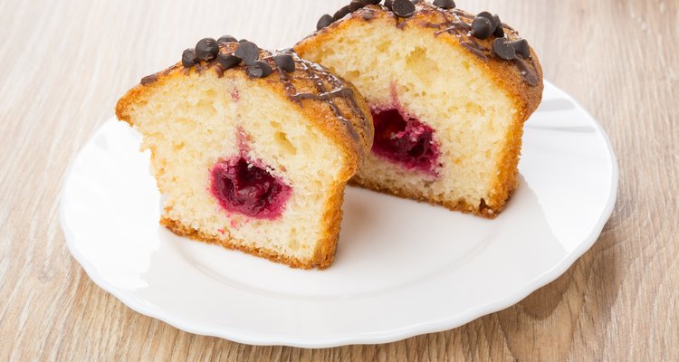 Pieces of muffins with stuffed and with chocolate in plate