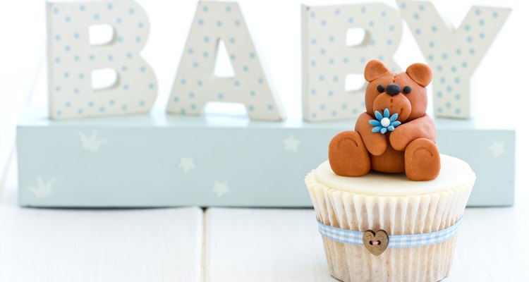 A decorative and cute cupcake for a baby shower