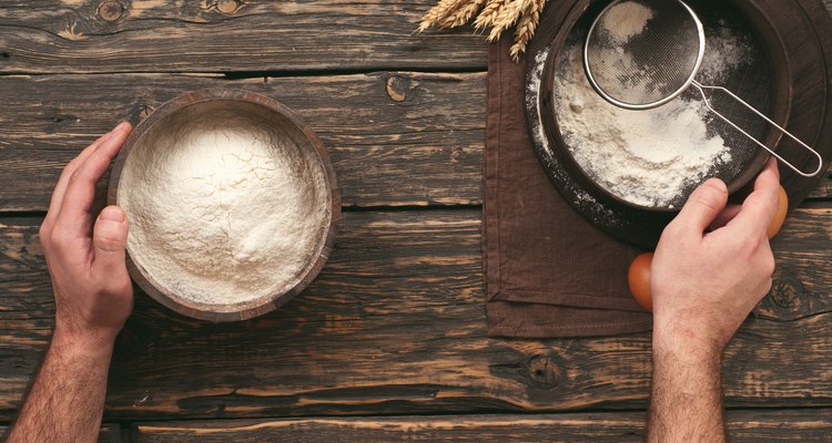 baker sifting the flour