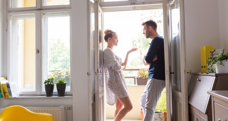 Couple arguing in the morning at home