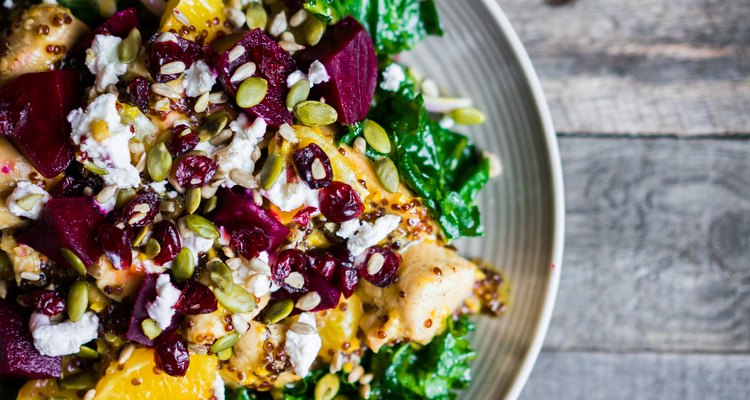 Healthy salad with grilled chicken,kale.beets and goat cheese