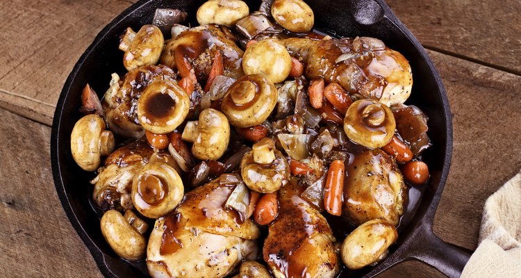 Coq au vin in large cast iron skillet