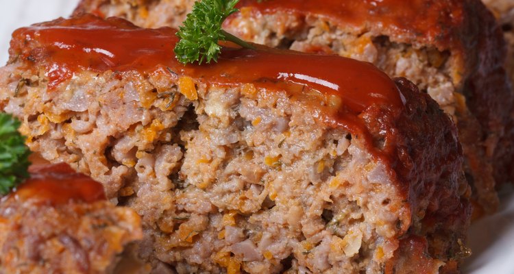 sliced meat loaf with ketchup and parsley