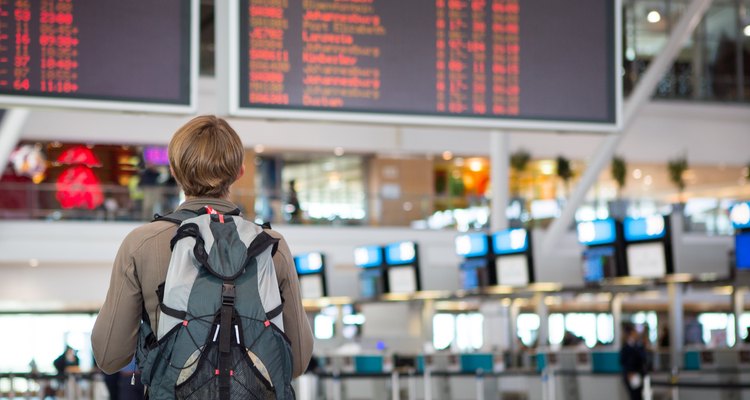 Female checking airline schedule