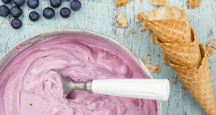 Blueberry ice cream on wooden background