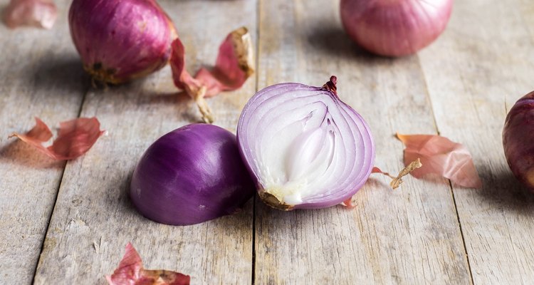 Shallot onions in a group on wood,still life